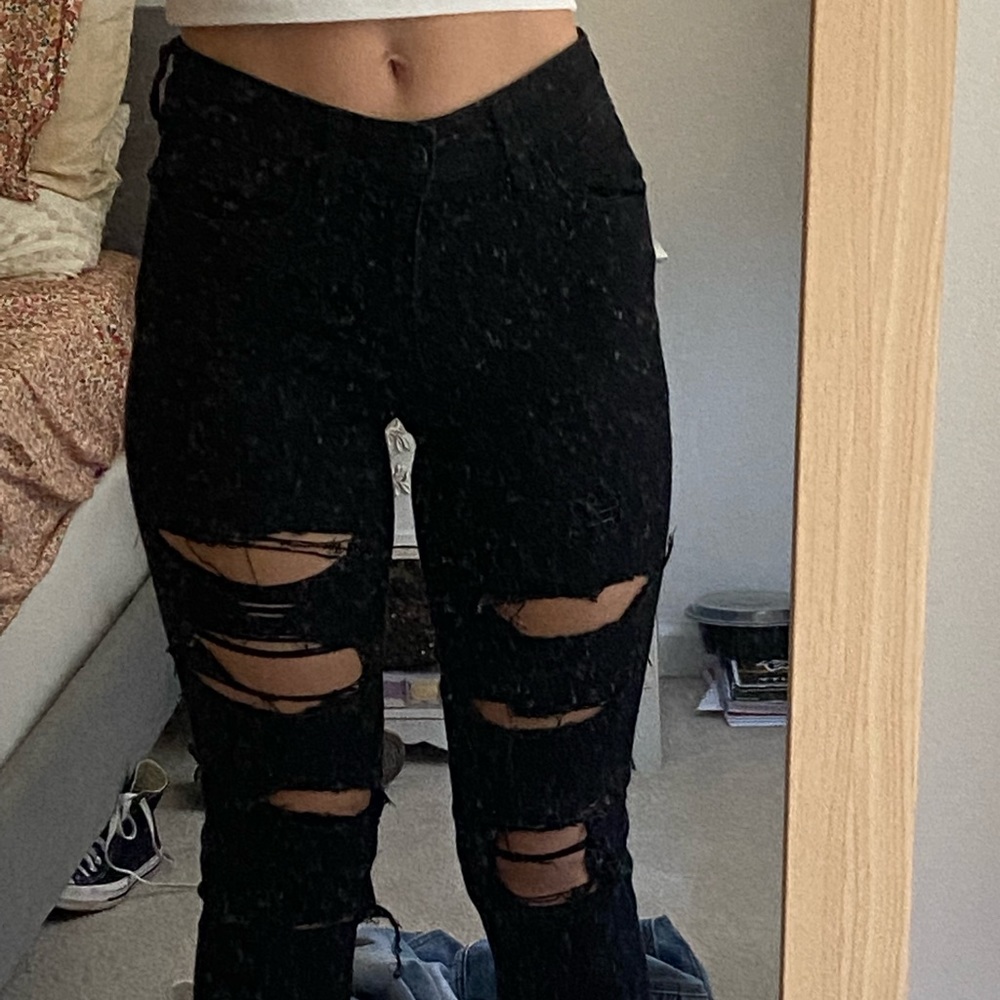 black ripped jeans